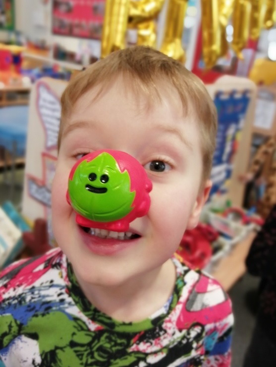 HAPPY: A pupil showing off his nose