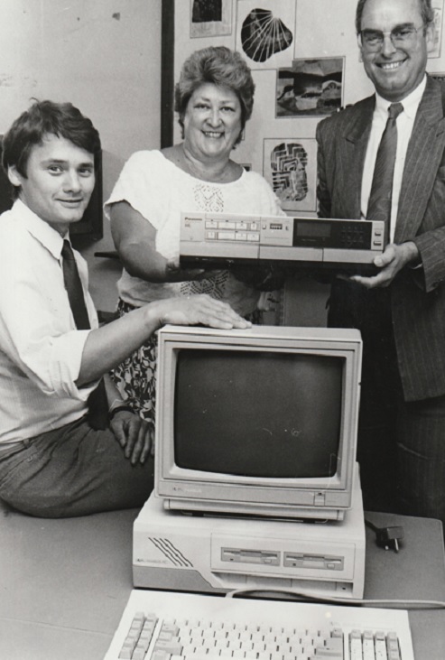 CHURCH: Proceeds from the Windermere Festival in 1989 paid for a Nimbus Computer for Windermere Church of England Junior School and a VHS Video Recorder for Applethwaite Green Old Folks’ Home. Festival chair David Smith is pictured handing the