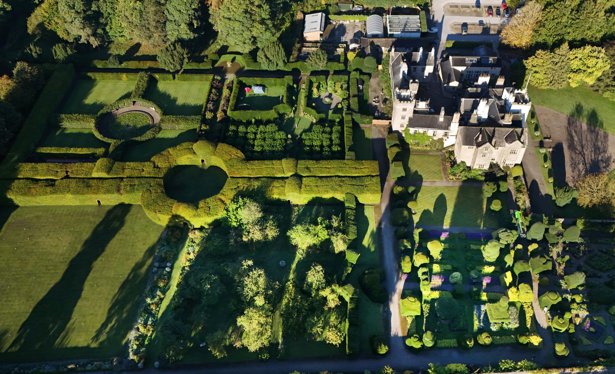 The trimming of the worlds oldest topiary gets underway at Levens Hall in Kendal, Cumbria. Head gardener for 38 years Chris Crowder 61, starts the trimming using a cherry picker which will take 2 months to complete. Levens Hall, a privately-owned house