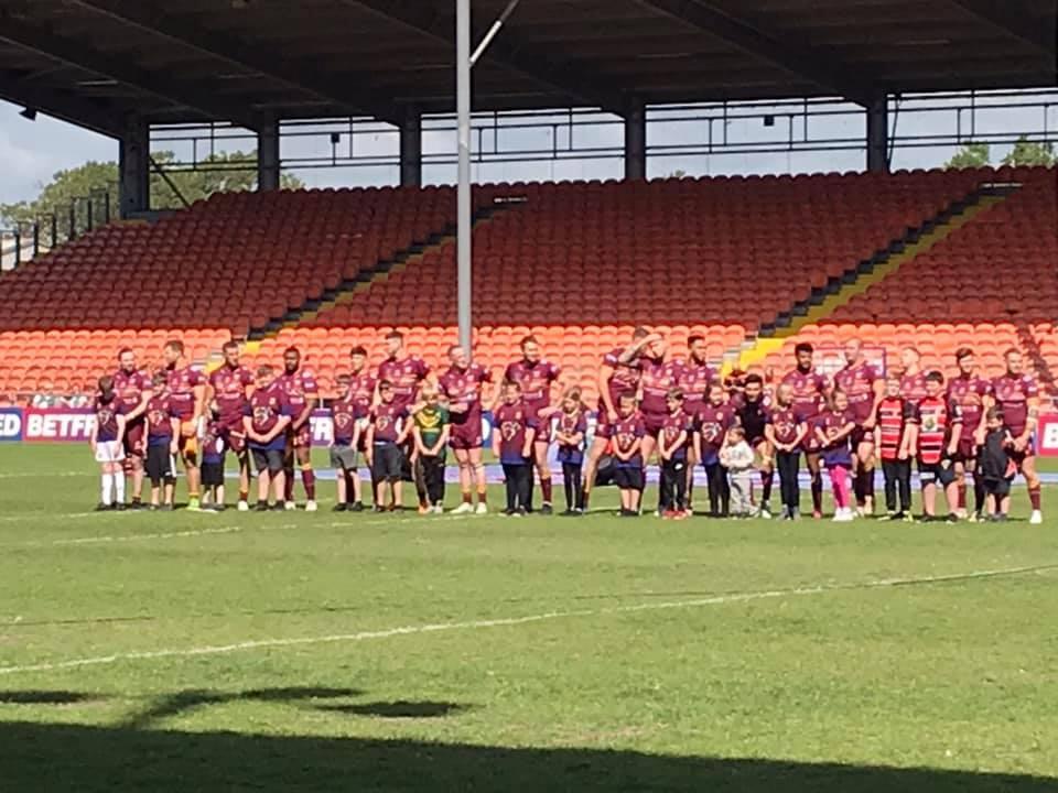 Millom S St James Catholic Primary School Raise Awareness For Autism At Blackpool S Bloomfield Road The Mail